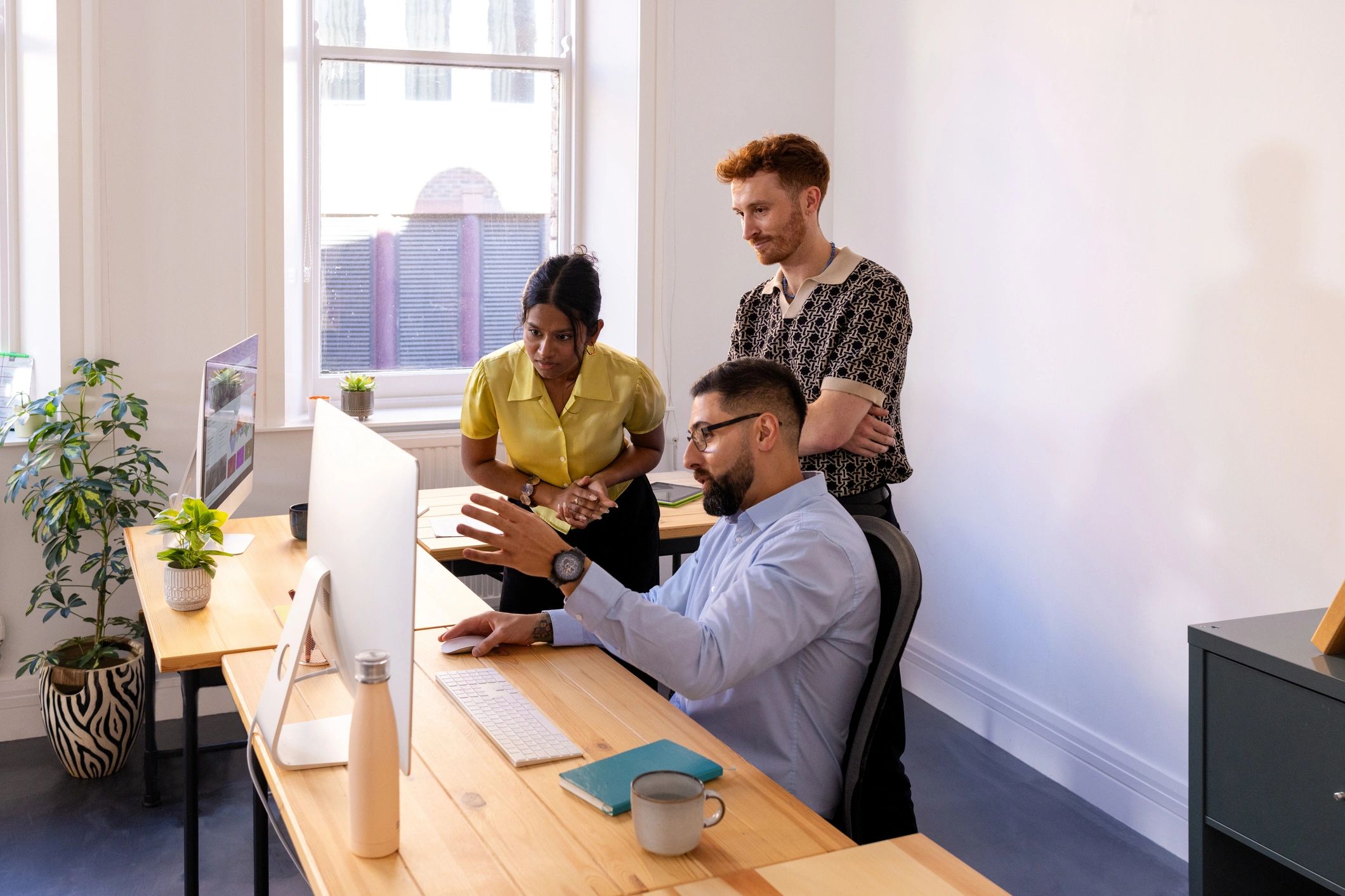 Small business team reviewing a website project together