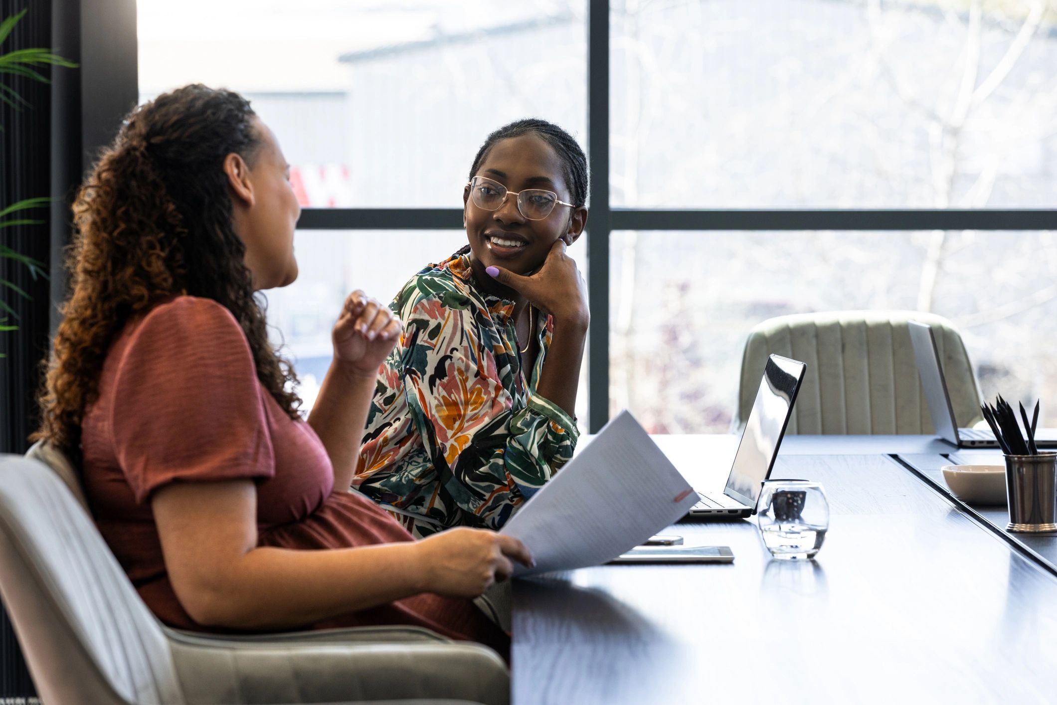 Client consultation in office focused on customer feedback and business growth