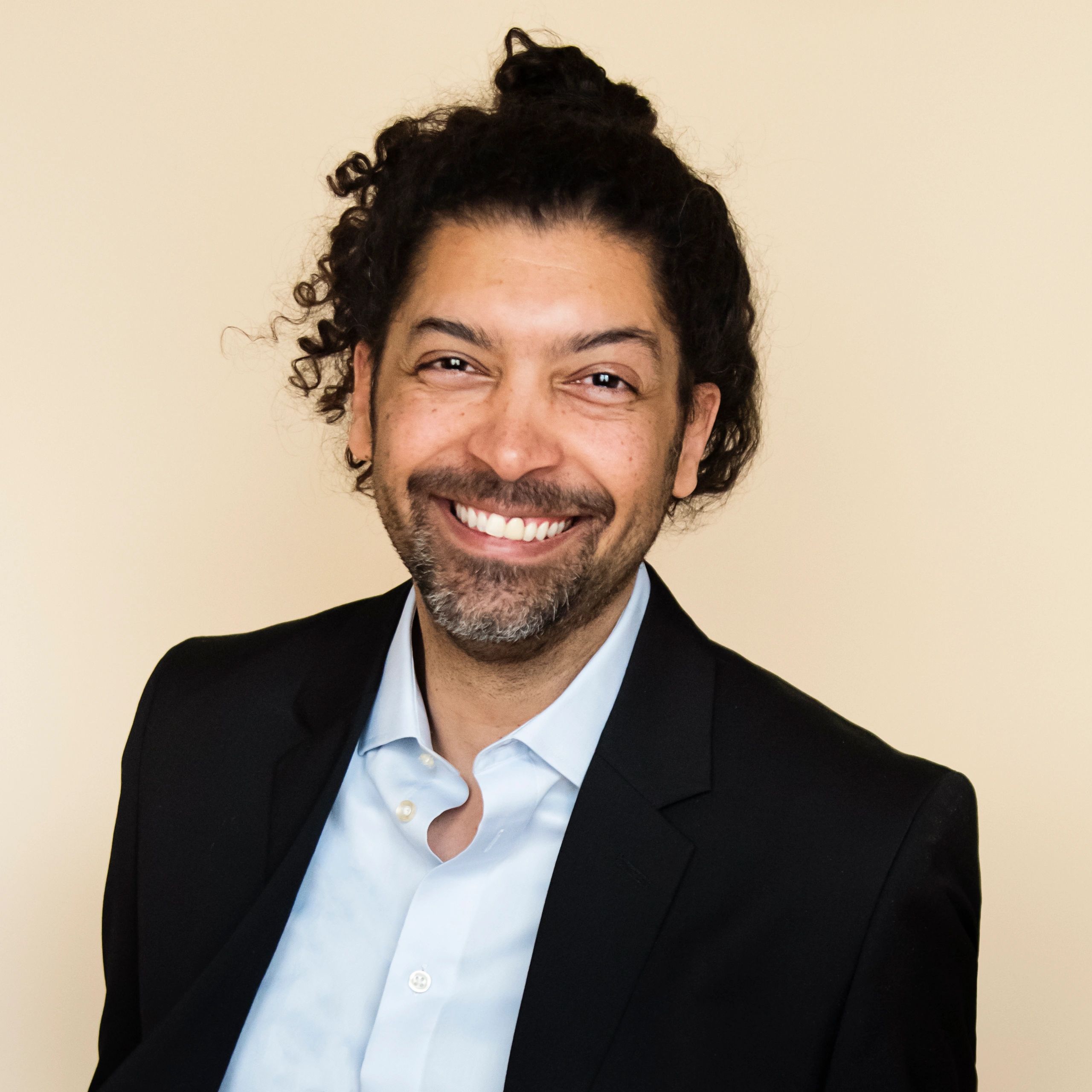 Professional portrait representing the strategy lead